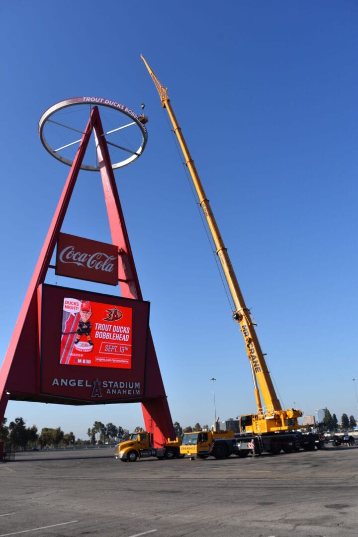 A mobile crane in a stadium